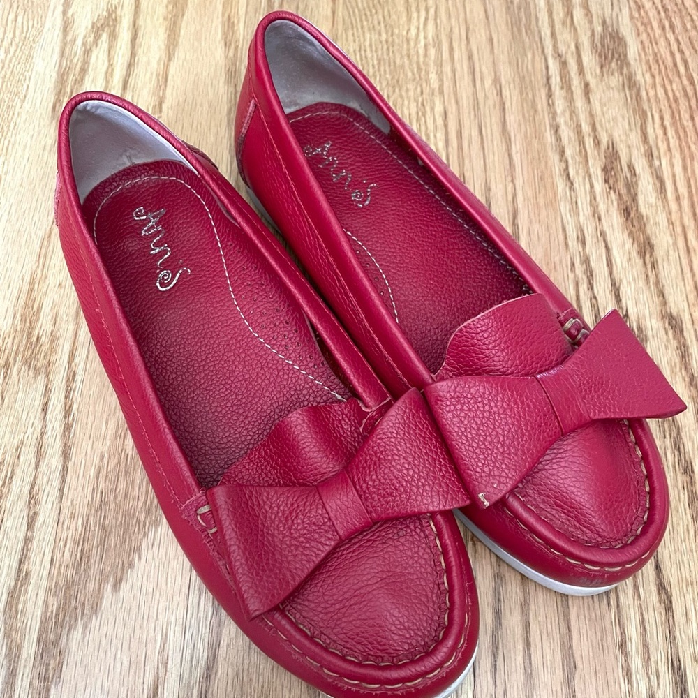 Red slip on flat shoes